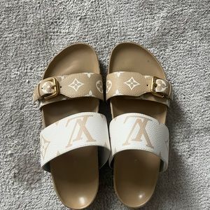 Louis Vuitton birkenstocks. Pre-worn. Size 37. Originally $900.